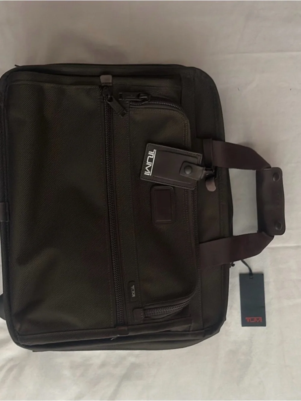 Tumi rolling briefcase